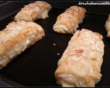 Foto del paso 8 de la receta Cañas de hojaldre rellenas de crema pastelera
