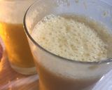 A picture of step 2 of Mango peach kiwi smoothy add qulfa mix.