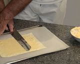 Foto del paso 3 de la receta Trenza de hojaldre rellena de crema y frutos secos