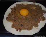 A picture of step 11 of Pizza with minced beef and egg.
