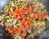 Foto del paso 4 de la receta: Arroz meloso con verduras y magro