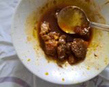 A picture of step 2 of Mutton Kebab with leftover meat and rice.