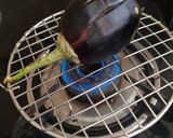 A picture of step 1 of Baingan Bharta.