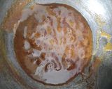 A picture of step 2 of Jaggery coated peanut.