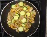 A picture of step 5 of Cashew Chicken with zucchini.