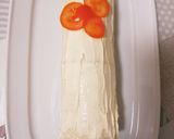 Foto del paso 4 de la receta: Arrollado de pan molde relleno de salmón ahumado y palmitos