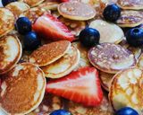 Foto del passaggio 6 della ricetta Mini pancakes con farina di riso, yogurt greco e cocco🥞🥥