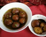 A picture of step 8 of Mawa Gulab Jamun from left over ghee residue.