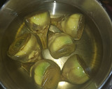 Foto del paso 1 de la receta: Arroz meloso de chipirones con alcachofas confitadas