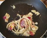 Foto langkah ke 3 dari resep Oseng Cumi Pedas Wijen Hitam.