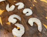 A picture of step 13 of Baked Garlic-Lime Chicken Drums and Shrimp.