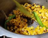 A picture of step 1 of Sweetcorn pulao.