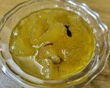 A picture of step 5 of Raw mango murabba with string candy.