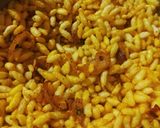 A picture of step 2 of Roasted Puffed Rice with caramelized onions.