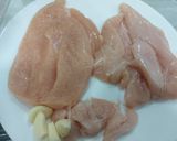 A picture of step 1 of Chicken breast with honey garlic sauce.