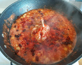 Foto del paso 2 de la receta: Arroz al horno de pasas y garbanzos