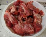 Foto del paso 3 de la receta: Carne en salsa con tomates asados, patatas y pimientos fritos