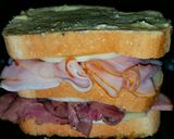 A picture of step 5 of Mike's Hot 3 Meat 2 Cheese French Dip Paninis.