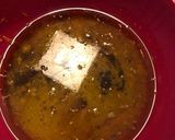 A picture of step 4 of Christmas cookies dipped in honey, aka melomakarona.