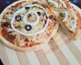 A picture of step 8 of (Say cheese) Beef pizza.