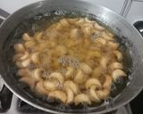 A picture of step 6 of Namkeen Kaju.