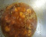 A picture of step 2 of Prawn curry with spring onion.