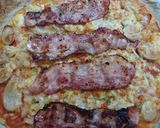 Foto del paso 4 de la receta Pizza casera Brackwurt con bacon y sofrito con curry