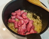 Foto del paso 2 de la receta: Salchichas guisadas con patatas y calabaza al tandoori masala