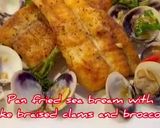 A picture of step 8 of Pan fried sea bream with sake braised clams and broccolini.