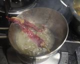 A picture of step 2 of Glueberry khatta pickle.
