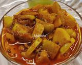 A picture of step 9 of Khatta Meetha Amla Pickle.