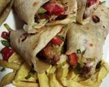 A picture of step 2 of Chicken wrap sandwich with potato wedges.