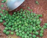 A picture of step 2 of Aloo matar gajar mix veggies.
