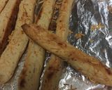 A picture of step 10 of Black pepper and Parmesan Grissini.