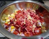 A picture of step 3 of Mix fruit and veg salad.