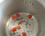 A picture of step 2 of Spicy Tangy Moong Khatta Mag Without Onions And Garlic In Cooker.