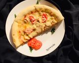A picture of step 26 of Chicken pizza.