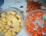 A picture of step 1 of Spicy Potato Curry with Carrots and Peas.