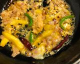 A picture of step 4 of Green Mango Chicken Curry.