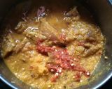 A picture of step 2 of Chicken masala curry.