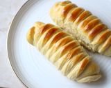A picture of step 11 of Stuffed Sausage Bread Rolls.