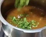 A picture of step 4 of Matar pulao.