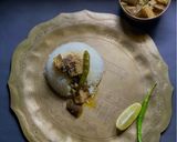 A picture of step 5 of Begun Jhaal Posto / Eggplant with Poppy seed paste for lunch in Thakurbari style.