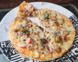 A picture of step 5 of SPICY PIZZA❤😋😋🔥.