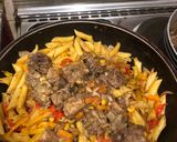 A picture of step 10 of Mac and bell peppers stir fry.