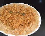 A picture of step 3 of American chop suey with fried rice.