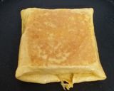 A picture of step 9 of Cheesy Egg Sandwich.