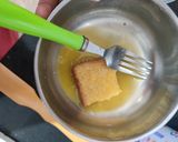 A picture of step 3 of Bread with egg.