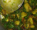 A picture of step 5 of Spinach Brinjal Potato Sabji.
