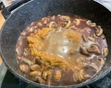 Une image de l'étape 16 de Sauté de veau aux champignons bruns.